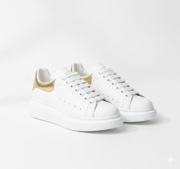 Alexander McQueen Oversized Sneaker – White/gold Luxury Craftsmanship & Urban Style