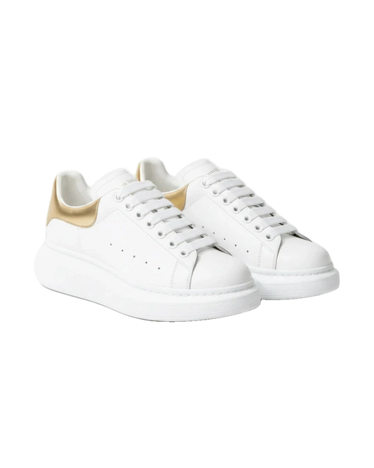 Alexander McQueen Oversized Sneaker – White/gold Luxury Craftsmanship & Urban Style