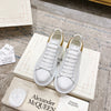 Alexander McQueen Oversized Sneaker – White/gold Luxury Craftsmanship & Urban Style