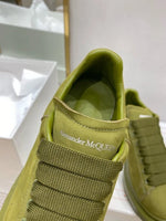 Alexander McQueen Oversized Sneaker – Olive Green Luxury Craftsmanship & Urban Style