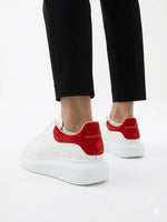 Alexander McQueen Oversized Leather Sneakers – White with Red Heel