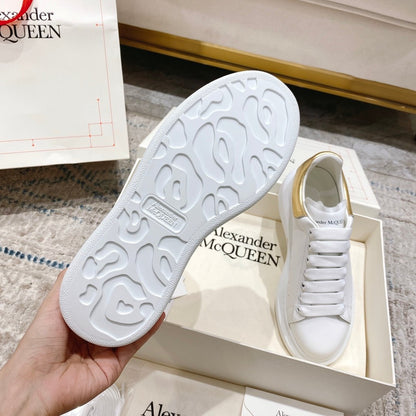 Alexander McQueen Oversized Sneaker – White/gold Luxury Craftsmanship & Urban Style